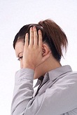 手稲の女性の頭痛の画像